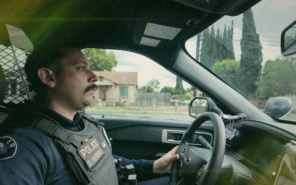 A Whittier police officer in a patrol car